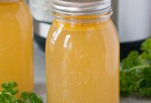 chicken stock in a jar with instant pot in background