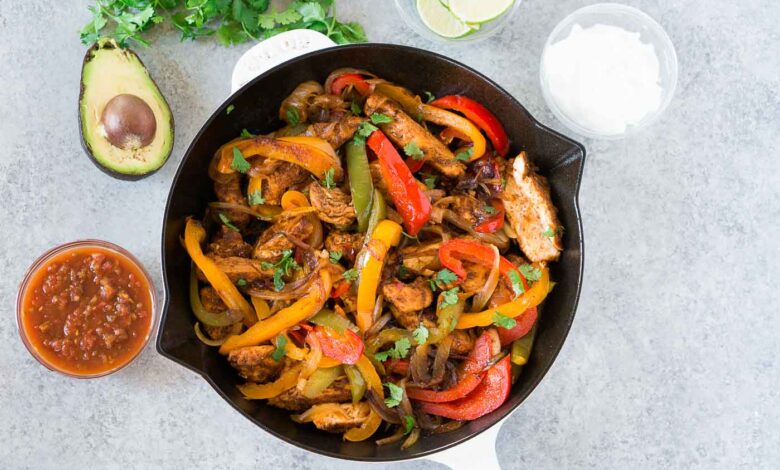 chicken fajitas in a skillet from above