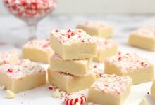 squares of white peppermint fudge stacked together