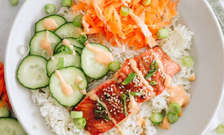 overhead of salmon rice bowls