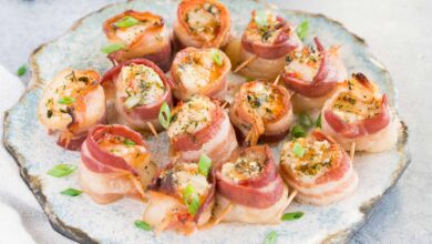 scallops wrapped in bacon on a plate