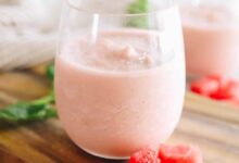 creamy watermelon smoothie recipe in a clear cup.